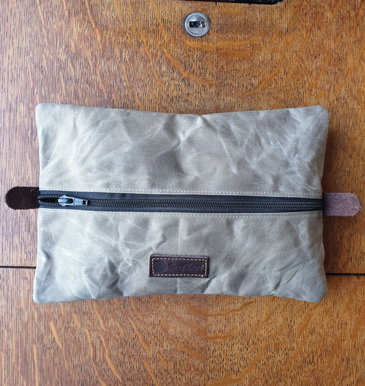 Waxed Canvas pouch to be used as dopp kit or travel gear bag and or as headphone and cables case